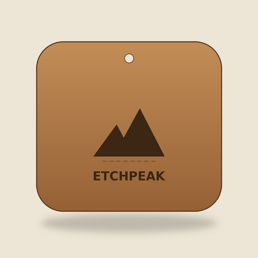 Custom laser-engraved wood cutting board personalized with a name and mountain design